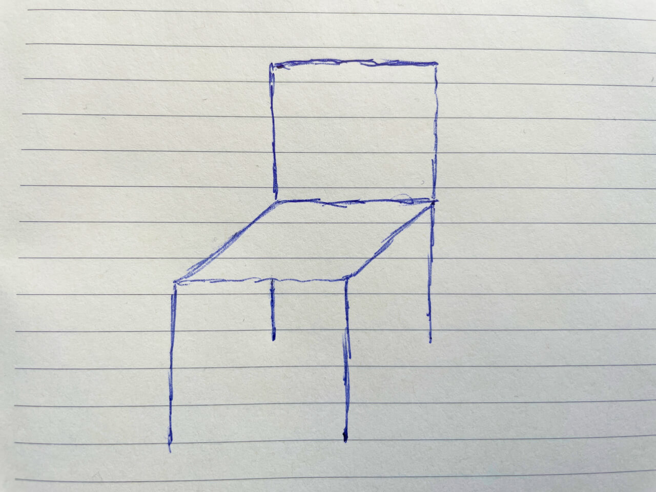 Hand-drawn chair on a piece of paper